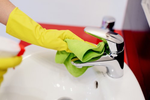 Professional carpet cleaner preparing equipment before a service appointment